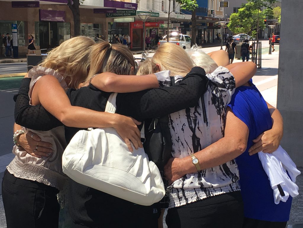 The mothers, aunts, sisters and grandmother of three little boys abused for three years by an Ipswich region teenage sex offender hug outside the Brisbane District Court on Tuesday, December 9, 2015. The offender was given a two-year suspended jail term. Photo Sherele Moody / APN NewsDesk The mothers, aunts, sisters and grandmother of three little boys abused for three years by an Ipswich region teenage sex offender hug outside the Brisbane District Court on Tuesday, December 9, 2015. The offender was given a two-year suspended jail term. Photo Sherele Moody / APN NewsDesk
